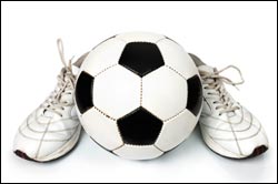 Soccerball and soccer boots