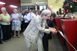 Lorraine Ling and Bruce Carboon cut ribbon