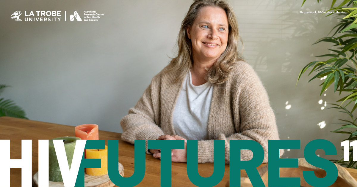 Woman in an oatmeal knit cardigan sitting at a dining table with a centrepiece of three candles, smiling, with text 'HIV FUTURES 11'