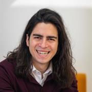 Headshot of Dr GJ Melendez-Torres