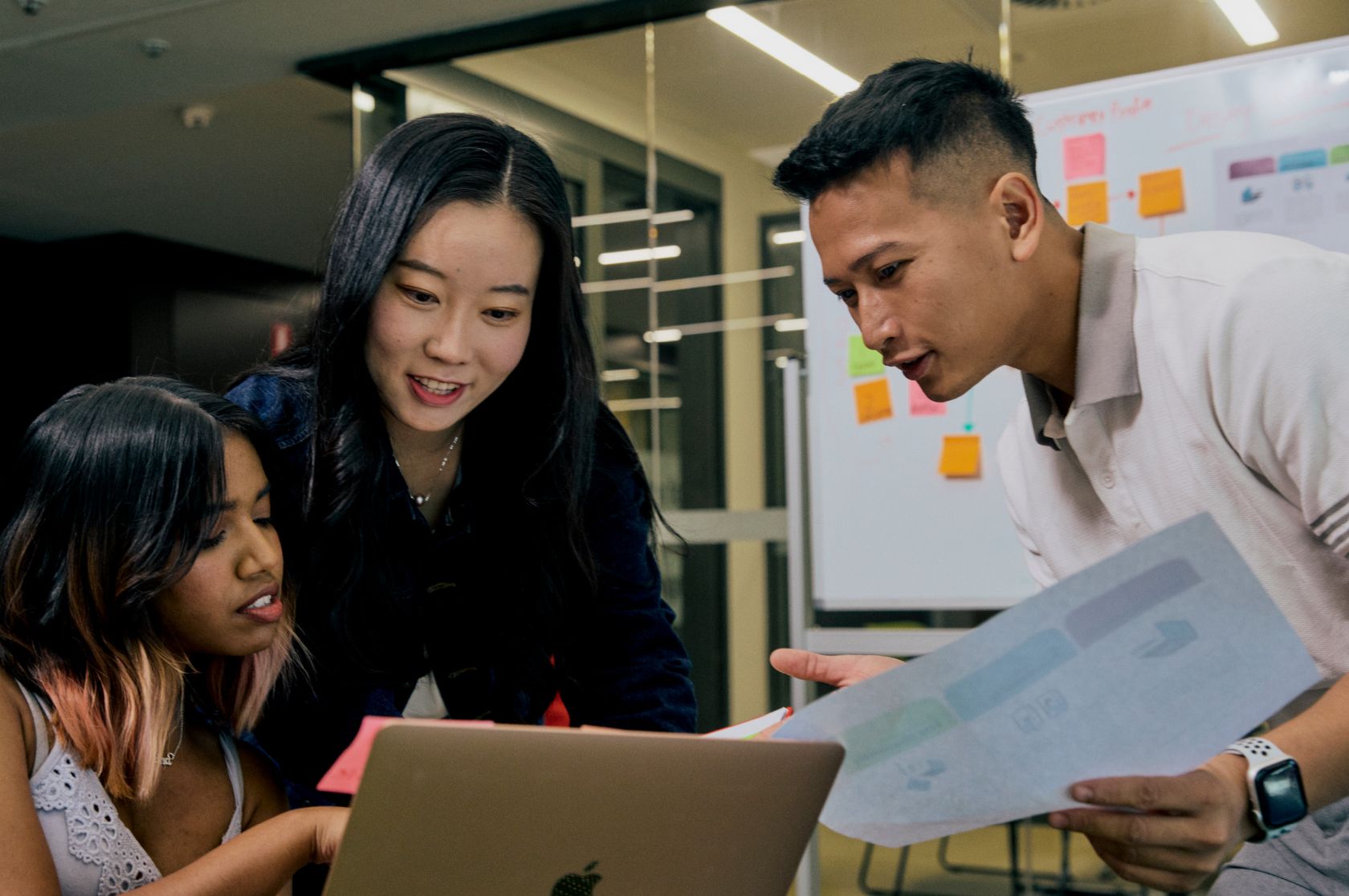 Team discussing reports in an office