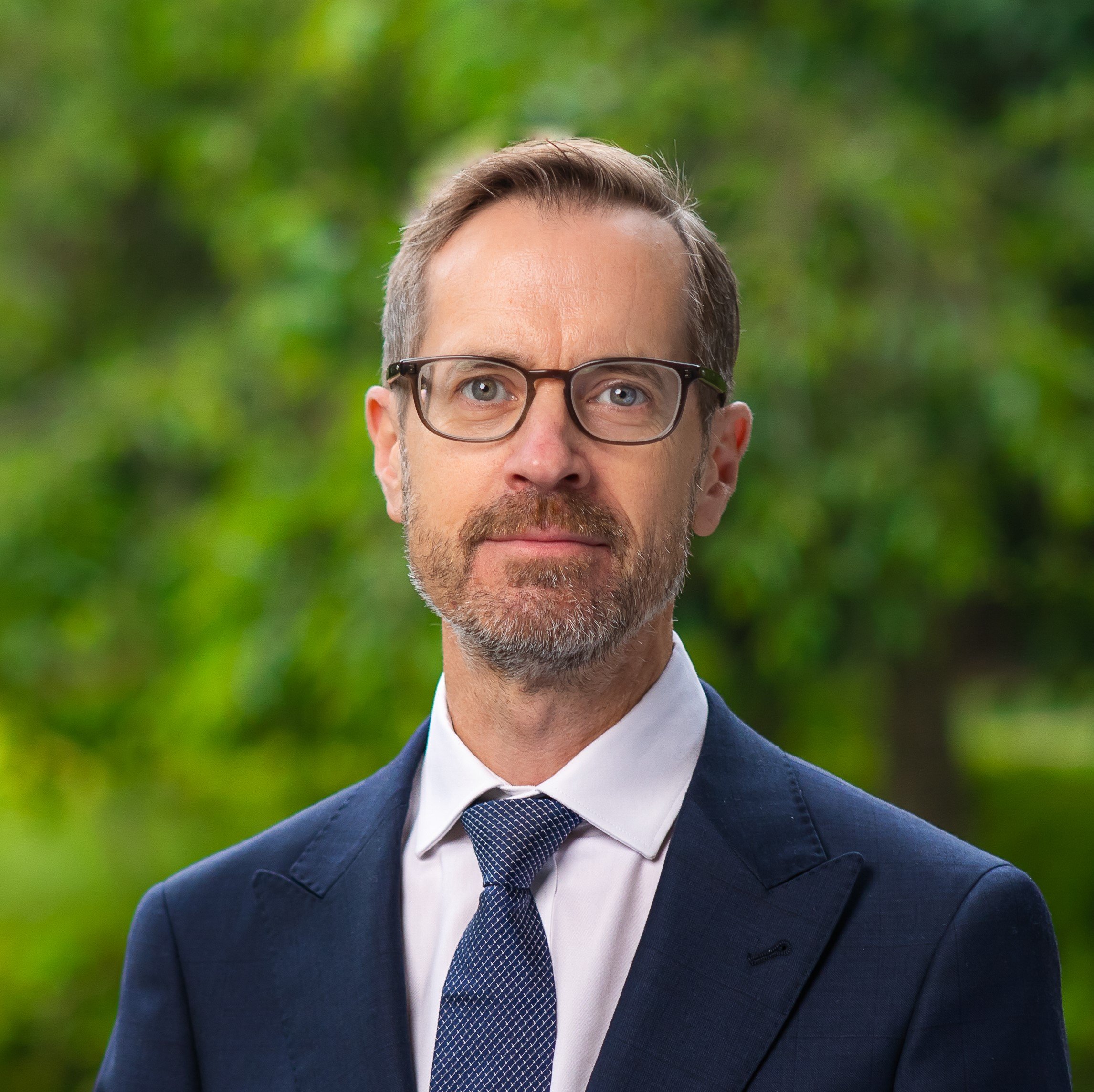 head shot of Professor Theo Farrell