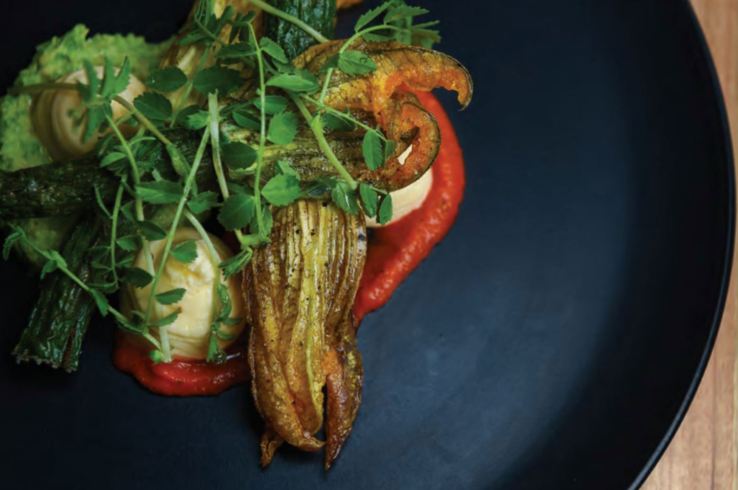 Stuffed zucchini flowers fine dining dish