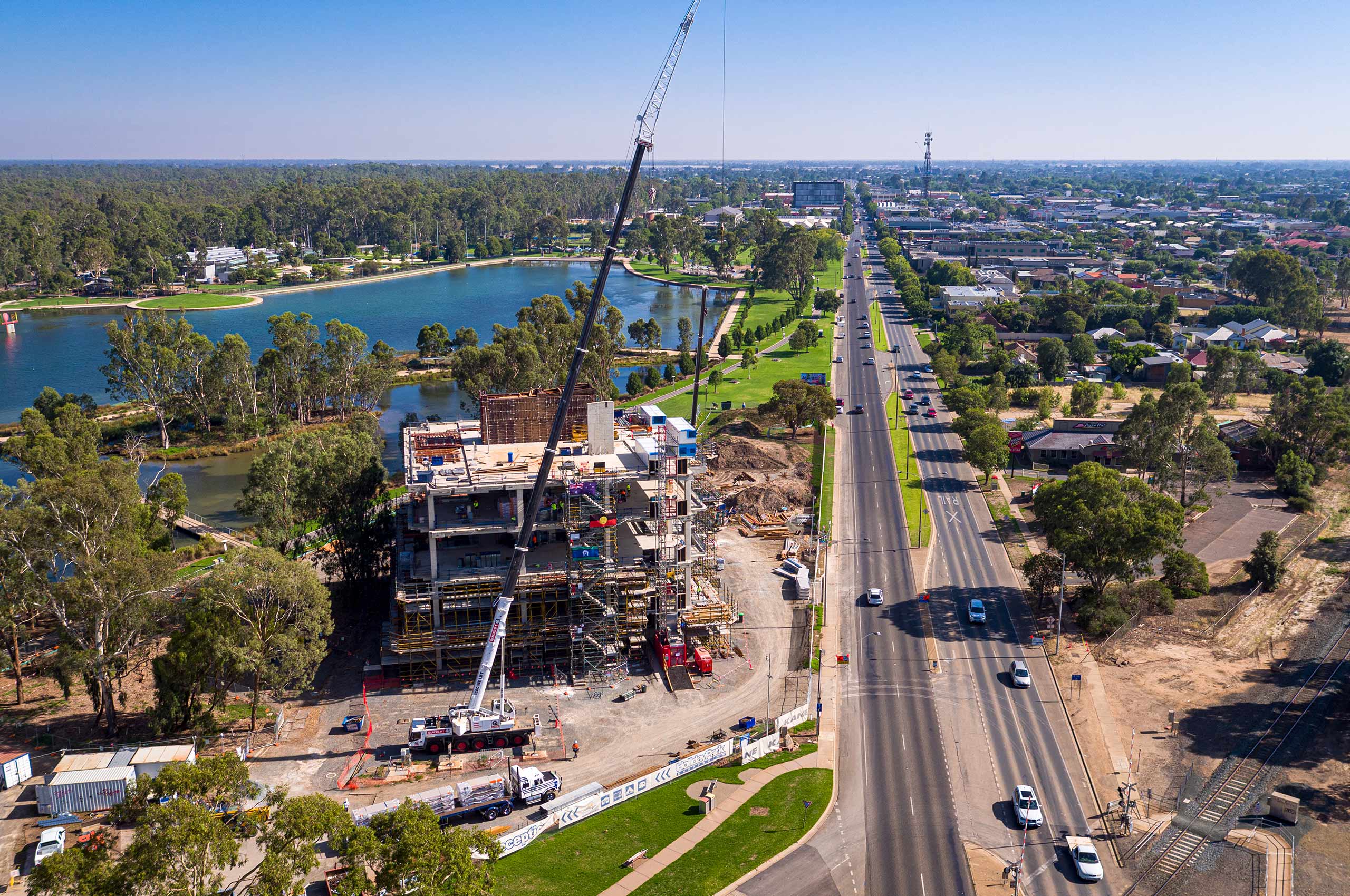 Aerial shot of Shepparton Art Museum in construction next to Victoria Lake.