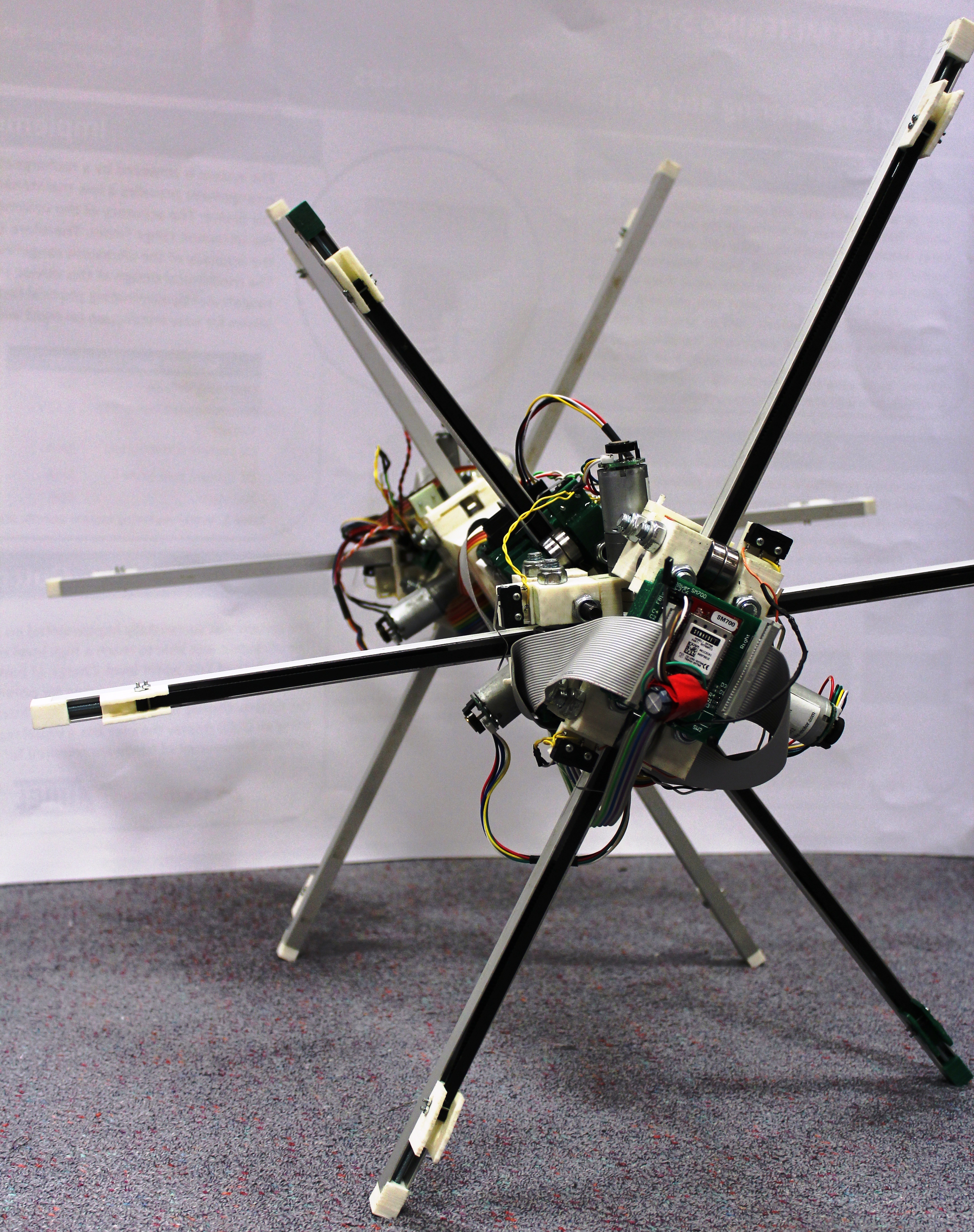 A Rimless Wheel Robot That Can Reliably Overcome Steps – BGOL