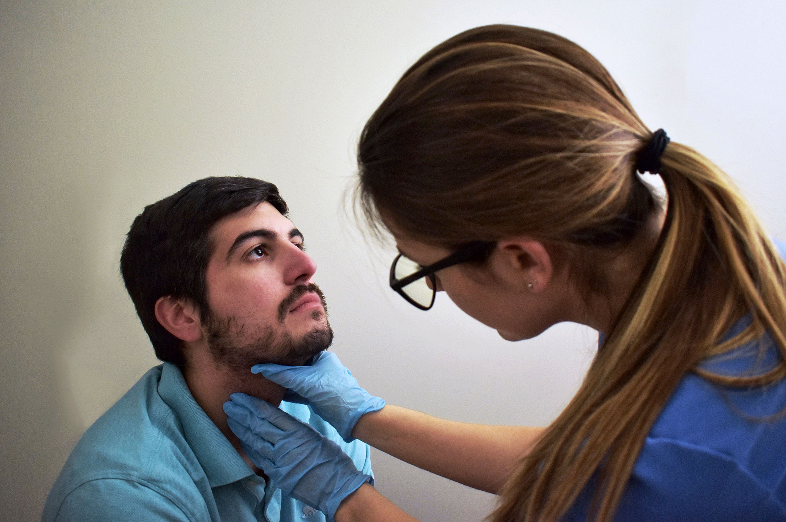 Speech pathologist doing test on patient.