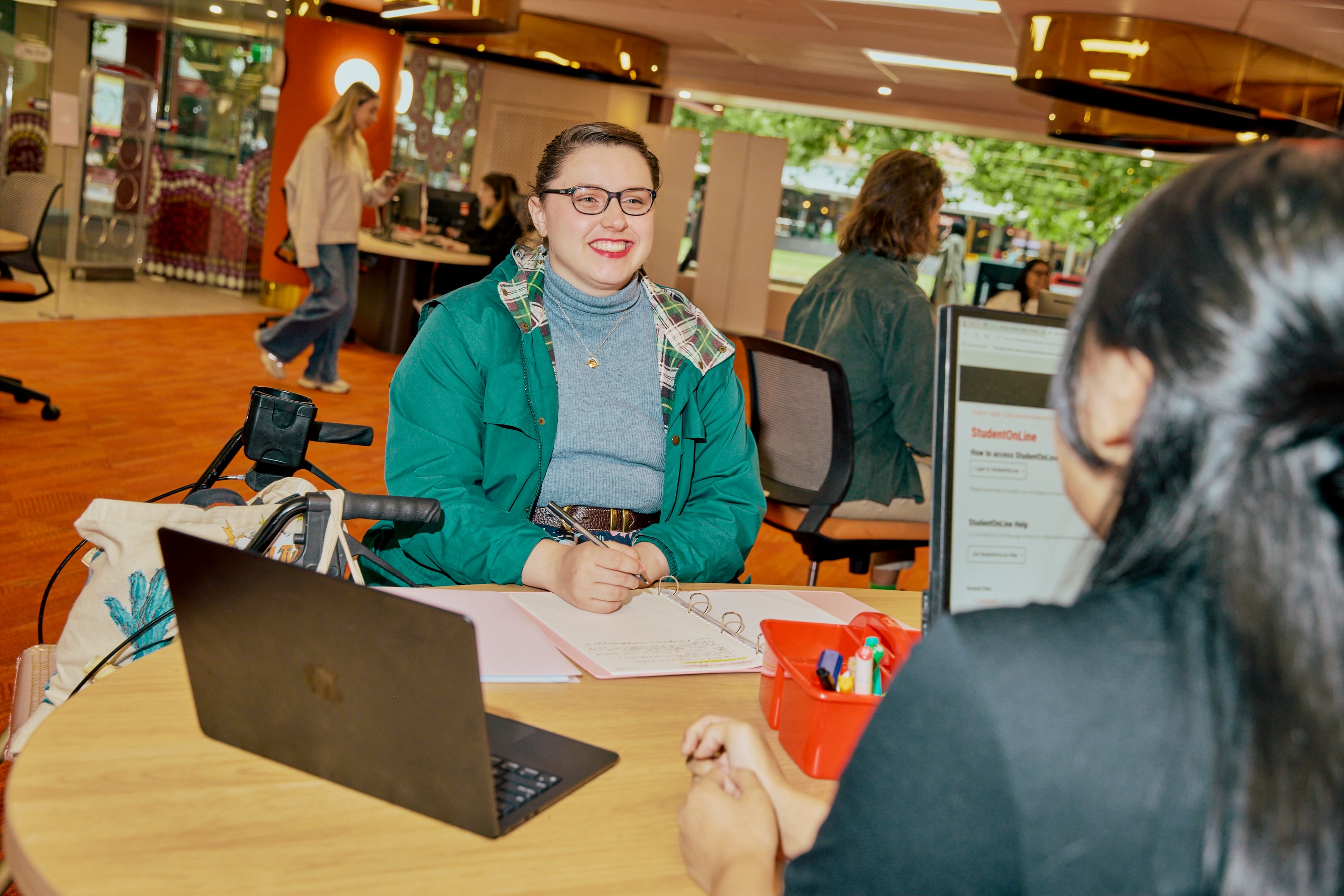 Image of a student in a one-on-one consultation.