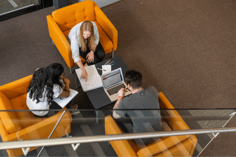 A group of students studying at a table