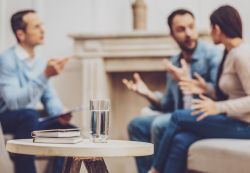 Couple in conflict during therapy session