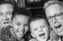 Two men and two children.