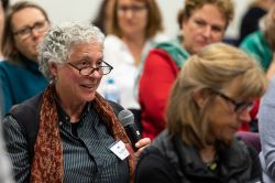 Female asking question in audience