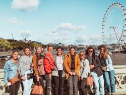 Emily Pendlebury with group in from of London Eye